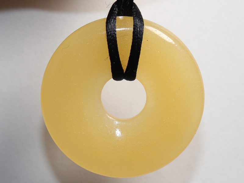 orange calcite with cord