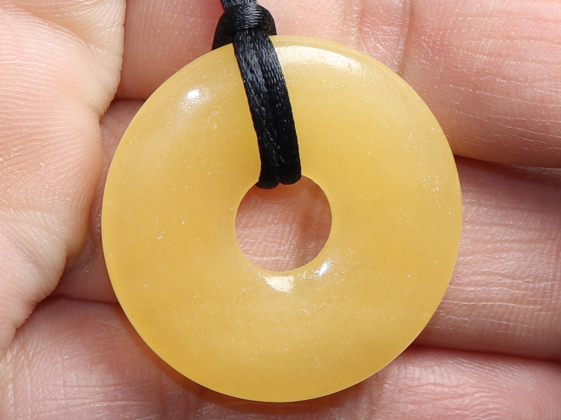 orange calcite with cord
