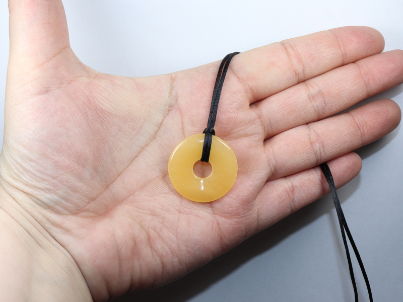 orange calcite with cord